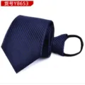 Detailed shot of the blue and black striped zipper tie, showing texture and zipper loop. - Navy Twill Y8653