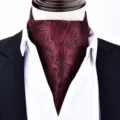 Men's burgundy paisley cravat ascot tie with white shirt and black suit for vintage style. - X902