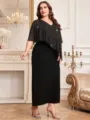Detail shot of the elegant plus-size black evening dress featuring a sparkly batwing overlay. - 5XL / Dresses / Black