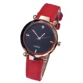 Detailed view of women quartz watch, red matte leather strap, faceted crystal glass, elegant style. - Red