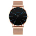 Minimalistische Geneva Quarzuhr mit roségoldenem Mesh-Armband und schwarzem Zifferblatt. - Netzrose Mit Rosenmuschel Und Blauer Nadel