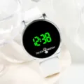 LED touch electronic watch detail, white strap round dial with green digital time display. - 23x2 / White
