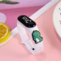Süße Dinosaurier LED Elektronik Uhr für Kinder, weißes Silikonarmband Digitaluhr Sport. - Kleiner Dinosaurier