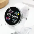 White silicone strap LED digital sports watch with round silver case for daily fitness and wear. - White