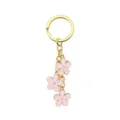 Portachiavi dorato con tre ciondoli a forma di fiore in smalto rosa per borse da donna. - Rosa