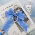 Blue pleated ribbon bow keychain with elegant pearl heart charm for bag and car - Blue