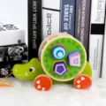 Wooden pull-along animal shape sorter toy for toddlers, early educational walking toy with colorful blocks. - Crocodile Style