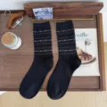 Retro Fair Isle patterned black mid-tube cotton socks for women, vintage style accessory. - Black
