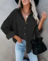 Stylish black corduroy button-down long sleeve shirt jacket for women, casual pocket top. - Black
