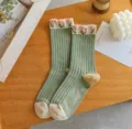 Green ribbed mid-calf socks for women featuring cute tulip cuff patterns and soft cotton knit fabric. - One Size / Green