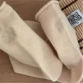 Soft cashmere postpartum socks for women winter warm thick rolled cuffs embroidered letters. - One Size / Cream White