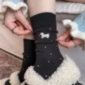Black cashmere blend mid-calf socks featuring cute embroidered dachshund and white polka dots. - Black