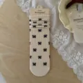 Women summer bow print mid tube socks ballet core cute casual breathable hosiery wear - Cream with All-over Bow Print
