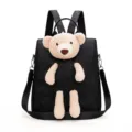 Cute black oxford cloth backpack for women featuring cute plush teddy bear decor school bag. - Black