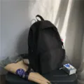 Schwarzer einfarbiger Nylon-Freizeitrucksack für Schüler, schlichter Schultasche. - S / Schwarz