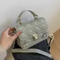 Grey quilted small square bag with chain strap, top handle and chic metal clasp design. - Green Type 2