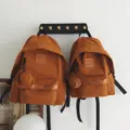 Lässiger Canvas-Rucksack mit großer Kapazität Schultasche für Pendeln und Reisen - Orange