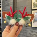 Cute Christmas reindeer antlers hair clip for kids holiday festive hair accessory main view - Pair Clip / White