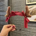 Christmas reindeer antlers headband with red bow hair accessory for festive holiday party. - Caramel (Antler Ribbon Style)
