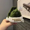 Green velvet Christmas hat hair clip with white plush trim and golden metallic festive lettering - Black Large Hair Clip (A9-6)