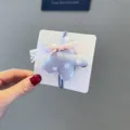 Adorable élastique à cheveux en tissu étoile à pois avec nœud rose pour les filles. - Élastique à Cheveux Étoile Gris Chaux