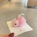 Cute pink fluffy bunny hair clip detail showing cute plush rabbit design and wings. - Pink Hair Clip