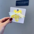 Jolie pince à cheveux étoile en tissu à pois jaunes avec beau nœud en dentelle pour enfants. - Élastique à Cheveux Étoile Jaune Vif