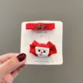 Süße rote Weihnachts Schleife Haarklammern Set für Babys, mit weichem Stoff und Weihnachtsmann Design. - Weihnachtsmann