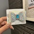 Glitzernde Schleifen Haarklammer für Mädchen mit blauem Strassstein in der Mitte für Kinder. - Pfauenblau (Y2-5)