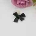 Détail de nœud en ruban noir exquis pour accessoires de cheveux DIY et décoration. - Noir