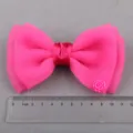 Nahaufnahme der rosa Mesh Schleife mit kleiner Rosenapplikation fuer DIY Handwerk und Dekoration. - Schleifenzubehör (T4-4) / Fuchsia