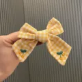 Yellow gingham bow hair clip with cute cherry embroidery, perfect for sweet daily hairstyles. - Hair Clip (32) / Yellow Hair Clip Style
