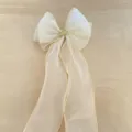 White organza hair bow with gold trim and crown accent, elegant hair accessory for little girls. - Champagne
