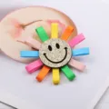 Bunte Kinder Sonnenblumen Haarklammer mit bunten Schleifenbändern und glitzerndem Smiley-Gesicht. - Gold