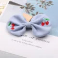 Cute children's blue knitted cherry bow hair clip, sweet princess hair accessories for girls. - Sky Blue
