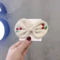 Cute cherry bow hair clip for girls, beige fabric hair accessory with cute embroidered fruit design. - Apricot