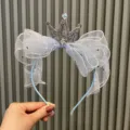 Blaues Kinder Kronen Haarband mit Mesh Schleife, glitzernder Strass Tiara Haarreif für Mädchen. - Himmelblau Stirnband Z1-3