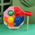 Banco da picchiare in legno con palline colorate e un martello per la prima educazione infantile - Stile B Palla da Martellare