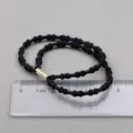 Black textured hair tie with gold metal connector, elastic hair band for daily ponytails. - Classic Black Thin Style
