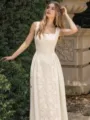 Detailed view of the elegant beige sleeveless dress featuring intricate floral embroidery. - S / Dresses / Apricot