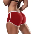 Close-up of ruched fitness shorts in red with white trim, highlighting elastic waist and tight fit. - S / Bottoms / Blue