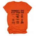 Close-up of the front print detail showing funny yarn craft quotes on the orange t-shirt. - 2XL / Tops / Burnt Orange (Black Text & Color Graphic)