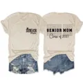Senior Mom 2027 graduation short sleeve t-shirt, casual round neck cotton blend top detail view. - S / Tops / Sand (Black Font)