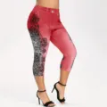 Details of red printed denim-look capri leggings with black floral lace side patterns. - S / Pink