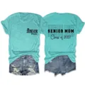Close-up view of the turquoise senior mom t-shirt front and back print details and denim shorts. - S / Tops / Deep Water Blue (Black Font)