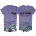Close-up detail of the purple senior mom class of 2027 short sleeve casual t-shirt. - S / Tops / Purple (Black Font)