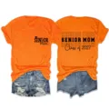 Senior Mom class of 2027 orange short sleeve t-shirt casual top for proud mothers graduation - S / Tops / Orange (Black Font)