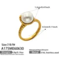 Detail view of the irregular curve pearl ring in 18k gold plated stainless steel, size specs. - Size 7 / Large Pearl Winding Style (A175) / Gold
