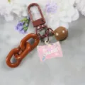 Llavero de caramelo con purpurina de resina marrón y dije, accesorio de bolso. - Estilo 7