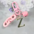 Porte-clés lettre Z en alliage rose avec chaîne et pendentif clochette mignon - Lettre Z